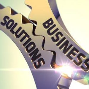 Business Solutions on the Golden Metallic Cogwheels. Golden Metallic Gears with Business Solutions Concept. Business Solutions on the Mechanism of Golden Metallic Gears. 3D.